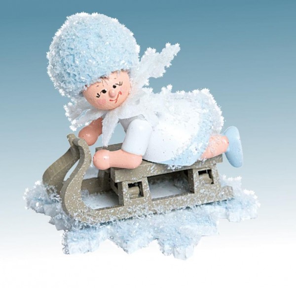 Schneeflöckchen mit Schlitten